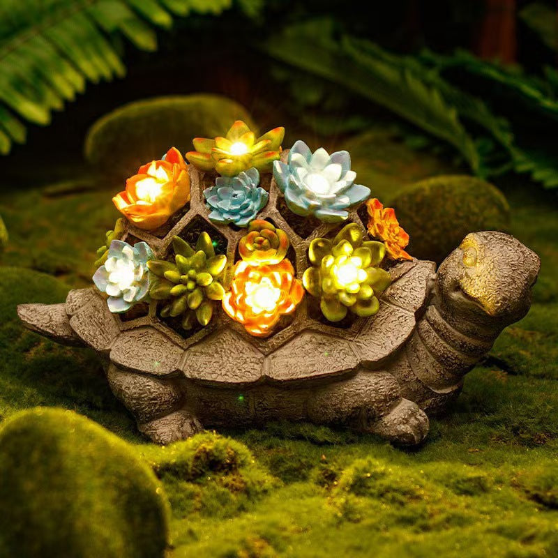 Solar-powered garden gnome sculpture with integrated LED fairy lights and turtle pot