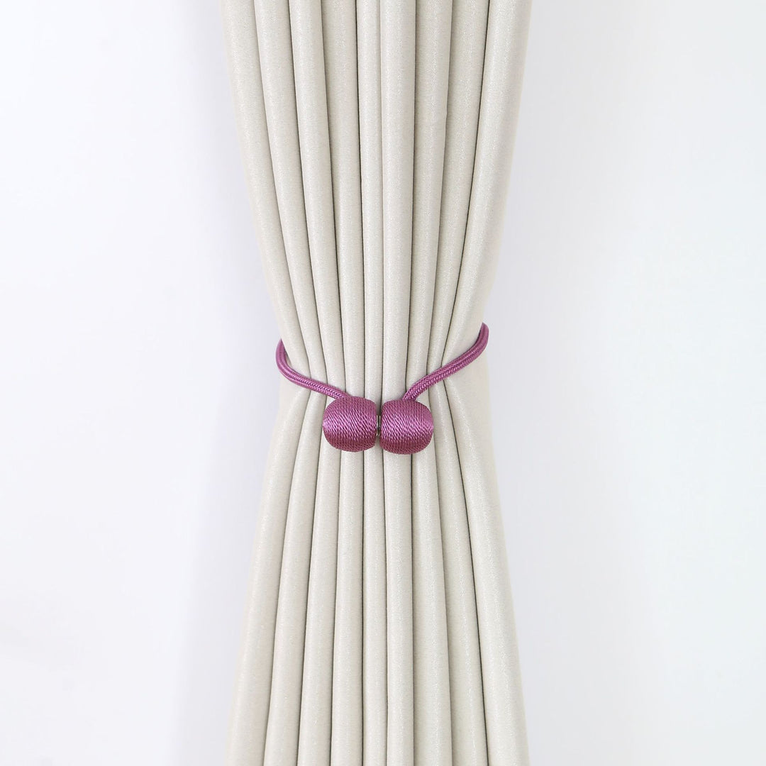 Decorative curtain tieback