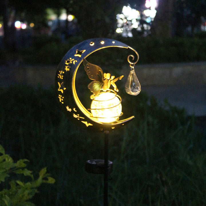 Solar-powered decorative garden stake light with crescent moon fairy lantern