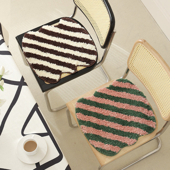 High-pile bath mat rug with diagonal stripe structure and organic shape