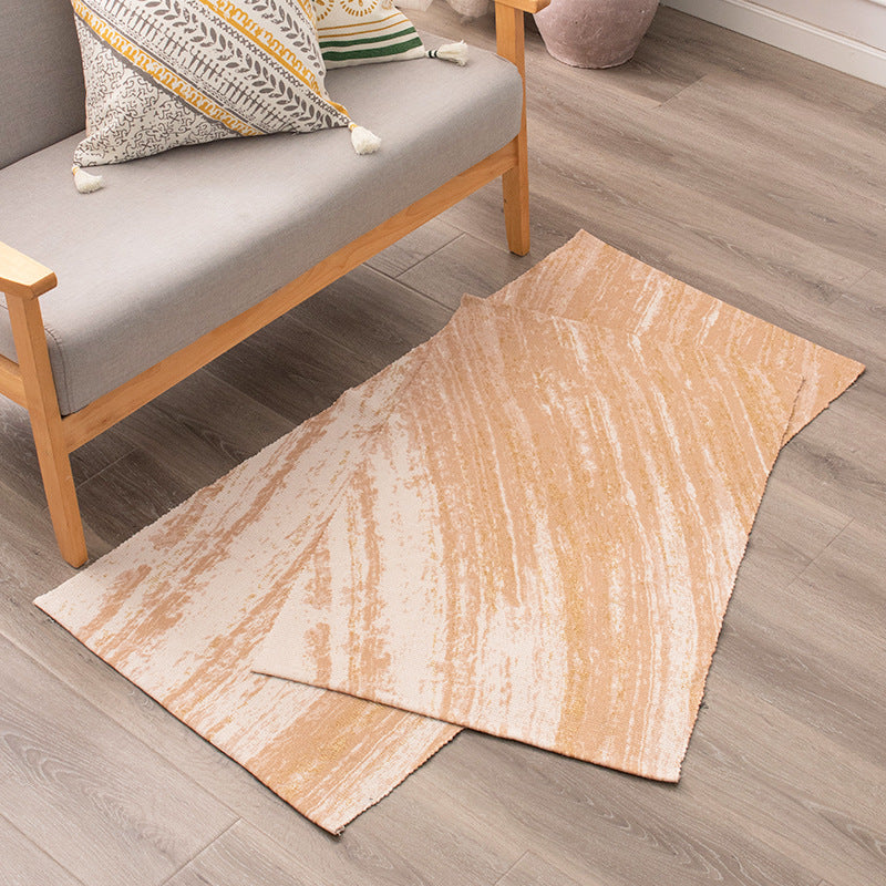 Flat-woven living room rug with marbled pattern and shimmering accent threads