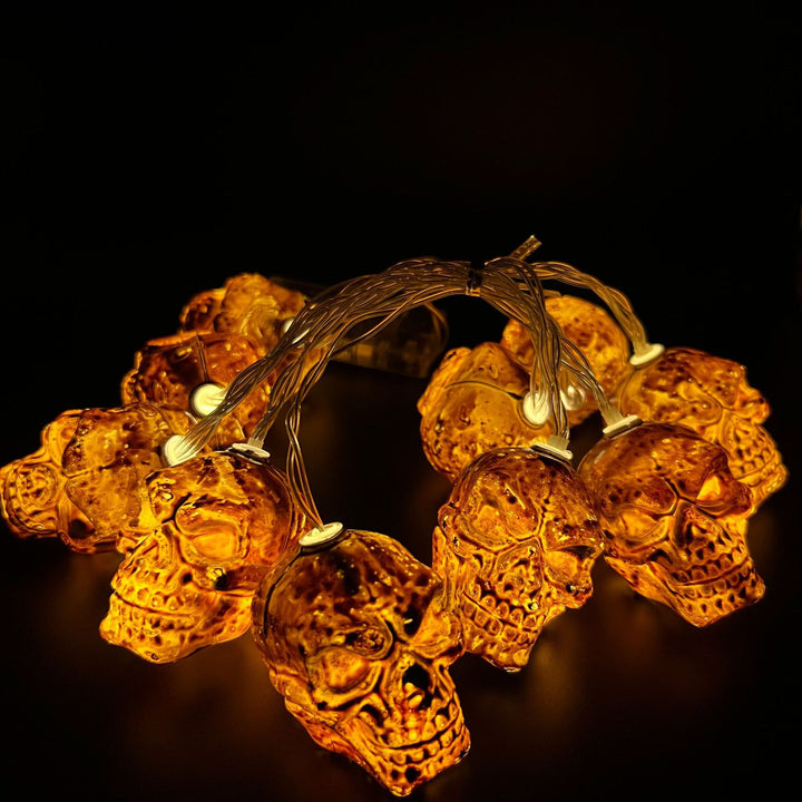 Amber Glass Skull Micro-LED String Lights on Clear Copper Wire