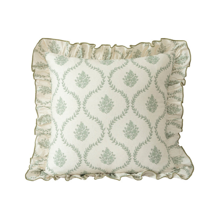Decorative pillow with ruffles and floral linen cover