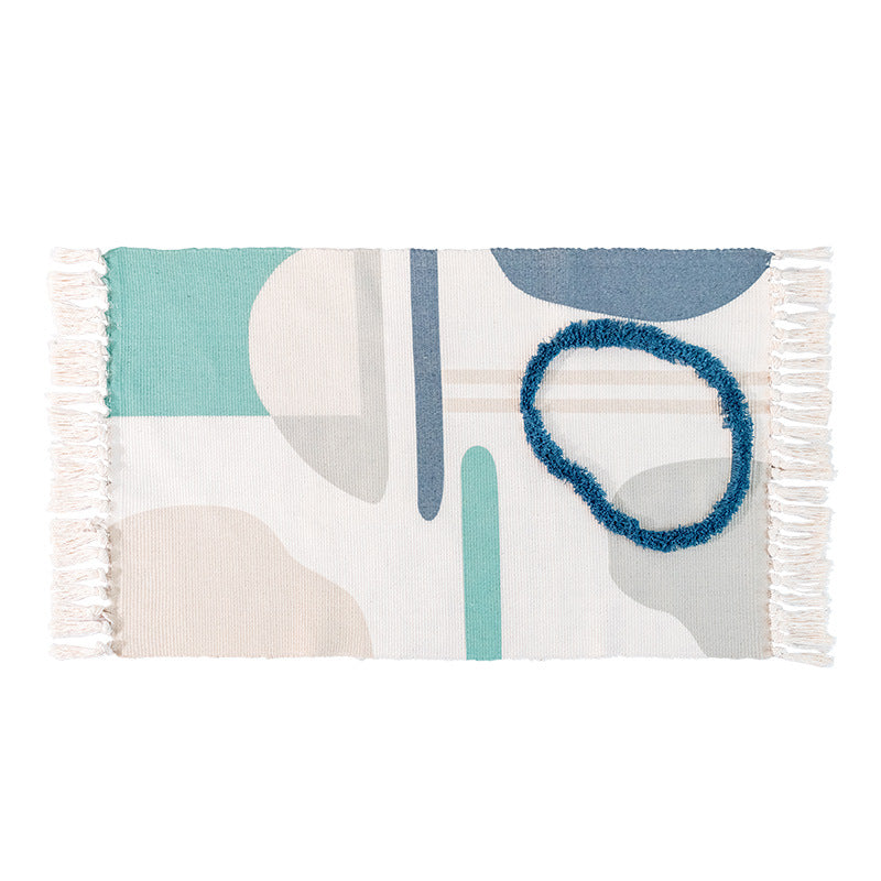 decorative woven bathroom runner with botanical jacquard pattern and fringes