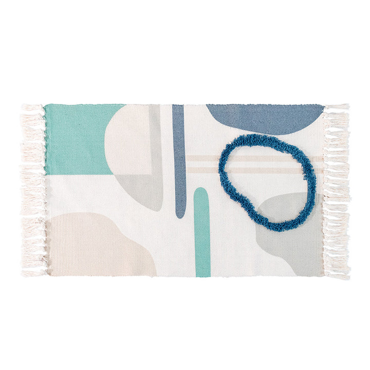 decorative woven bathroom runner with botanical jacquard pattern and fringes