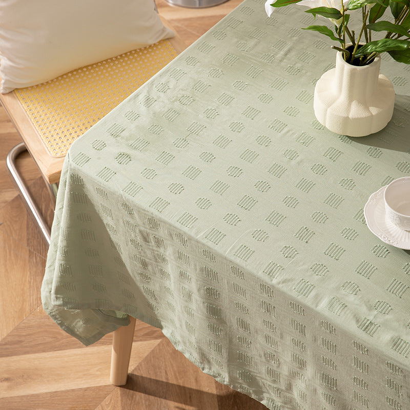 Rectangular tablecloth with jacquard-like structure, water-repellent surface and easy-care fabric