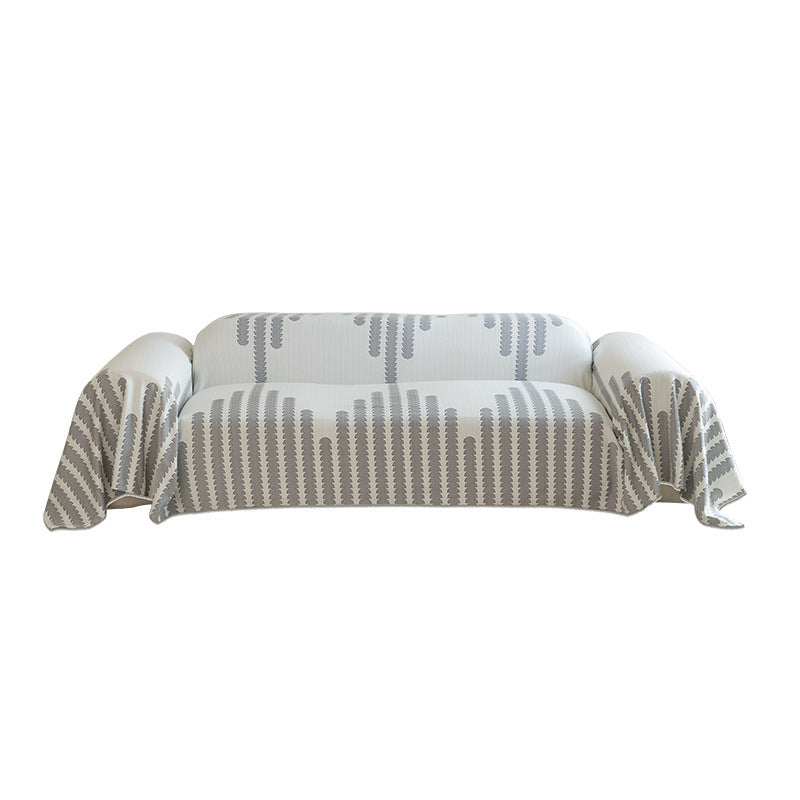 Elastic sofa cover made of jacquard cotton blend fabric with graphic relief pattern