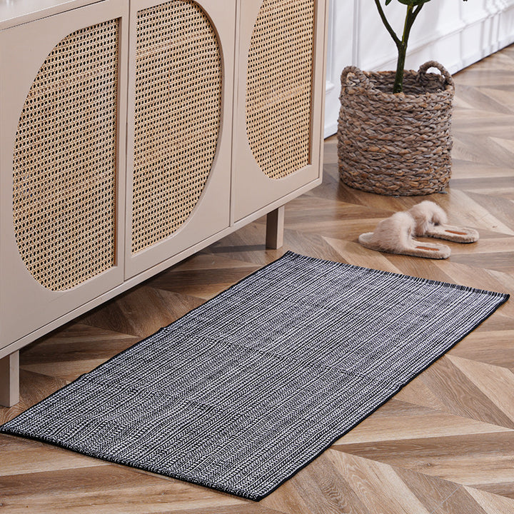 woven living room runner with fringes and geometric weave pattern