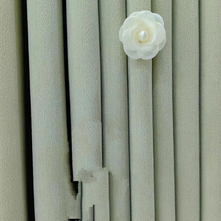 Decorative curtain clip with flower design