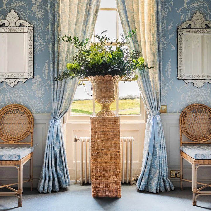 Decorative plant pot stand made of woven material