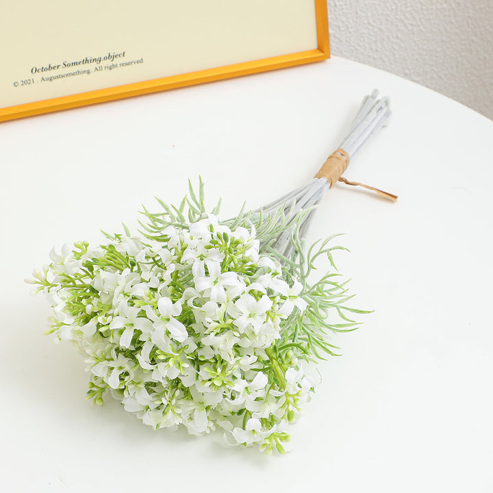 Decorative artificial flower arrangement