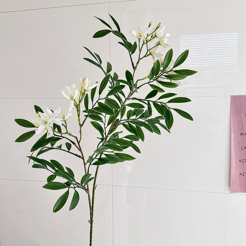 Decorative artificial flower branch with delicate flowers