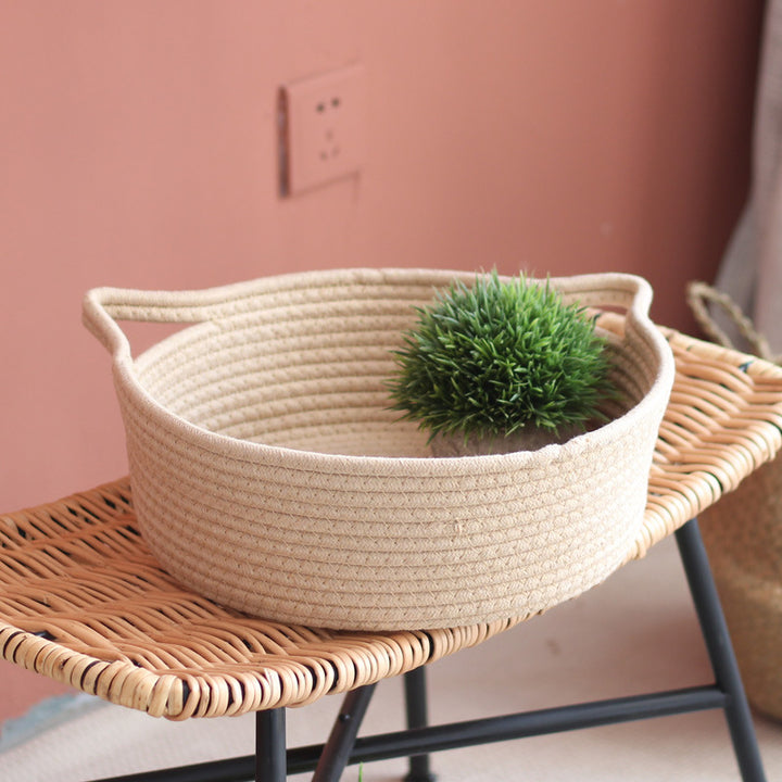 Decorated basket with practical handles