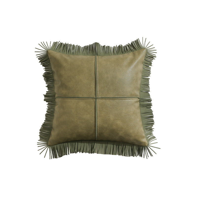 Decorative faux leather cushion with fringes and decorative seam
