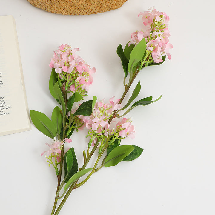Artificial flower branch with bright flowers
