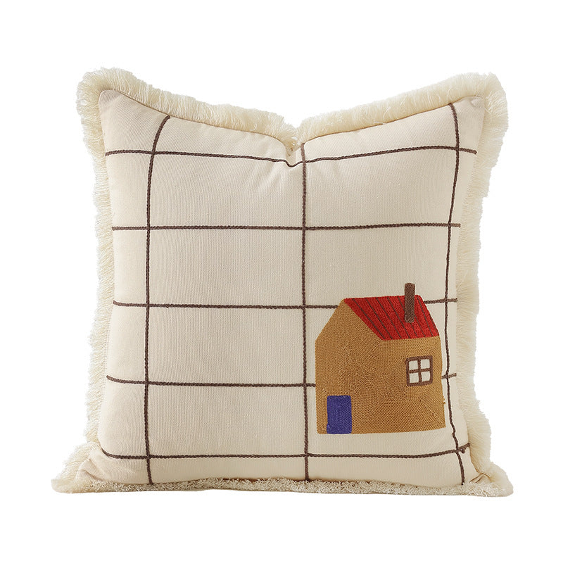 Decorative cushion cover made of cotton blend with fringes, check pattern and embroidered house
