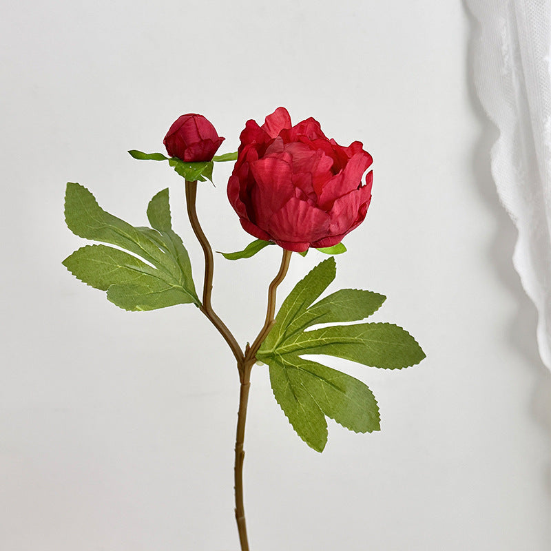 Artificial peony bouquet with delicate flowers and leaves