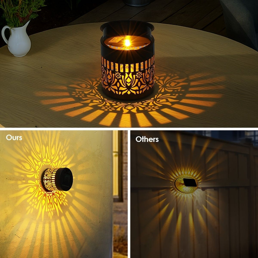 Decorative filigree metal tealight lantern with reflective inner lining
