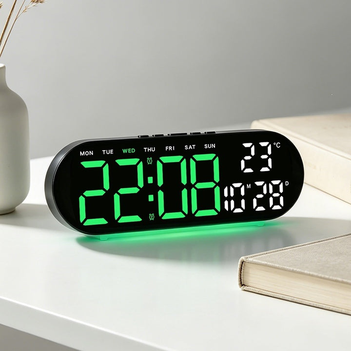 Digital alarm clock with multifunctional LED display and integrated thermometer function