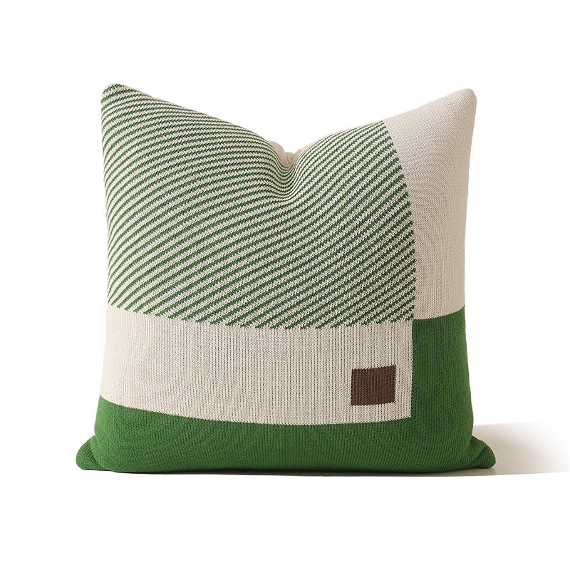 Woven cushion cover with checked jacquard relief and concealed zipper
