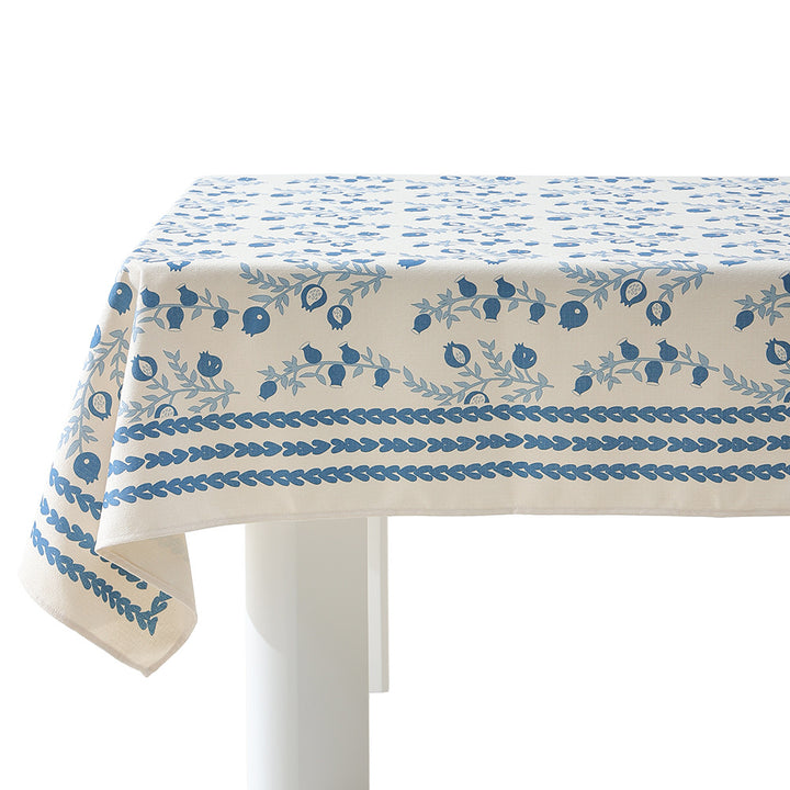 Cotton blend tablecloth with woven floral border decor and green hem