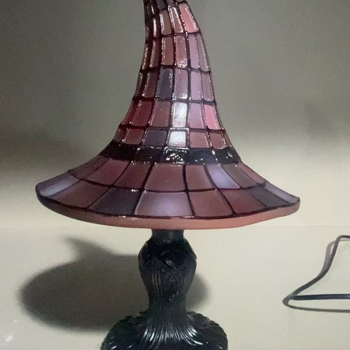 Decorative table lamp in witch hat design