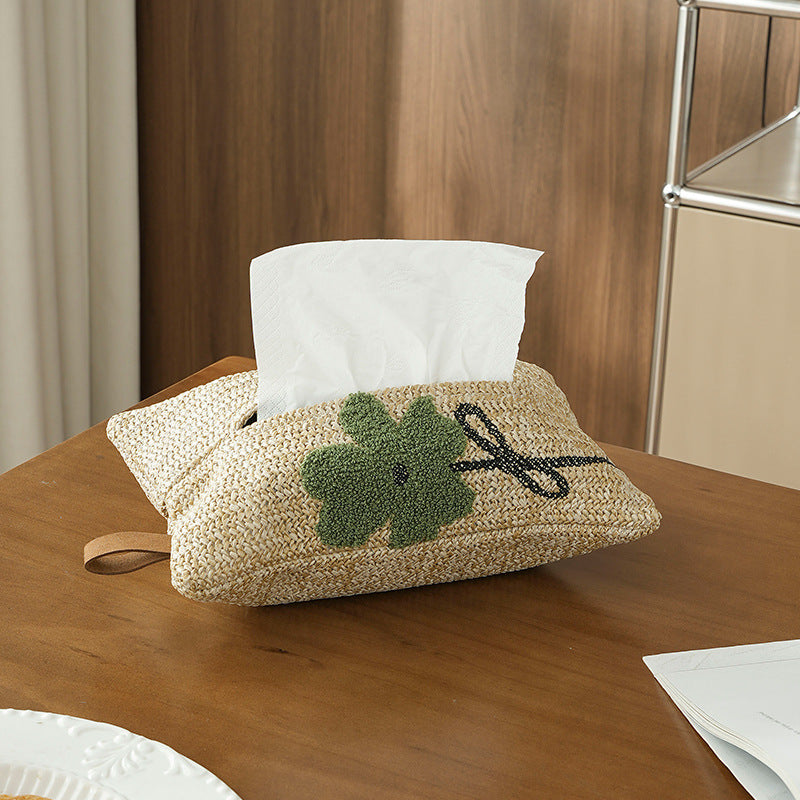 Woven tissue box cover in straw look with embroidered flower motif