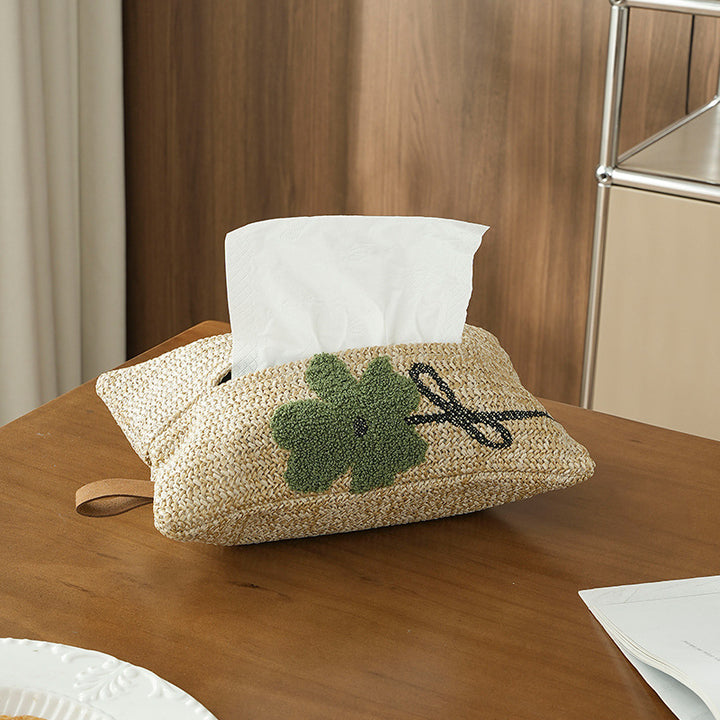Woven tissue box cover in straw look with embroidered flower motif