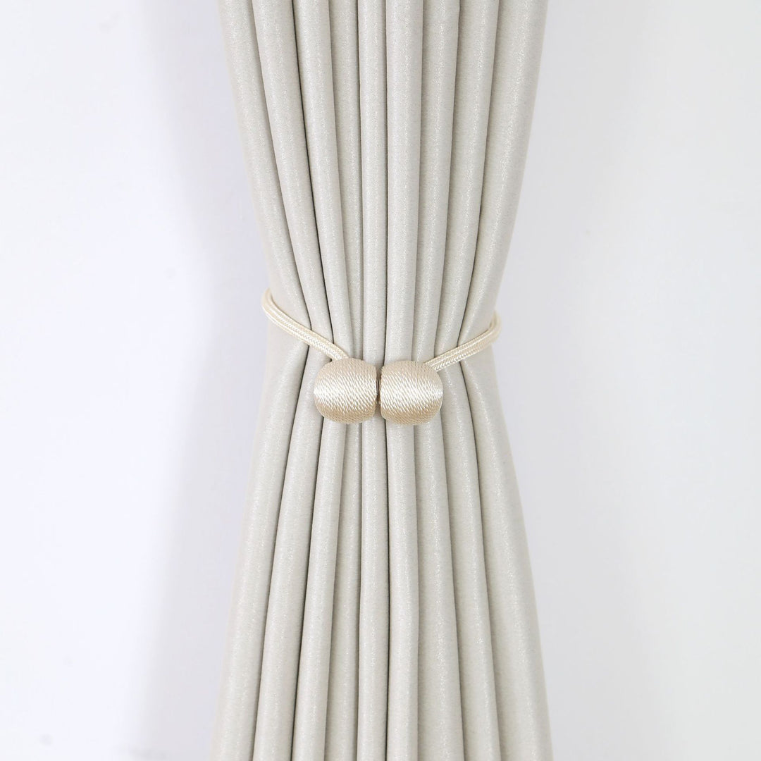 Decorative curtain tieback