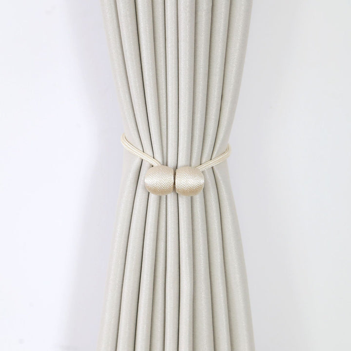 Decorative curtain tieback