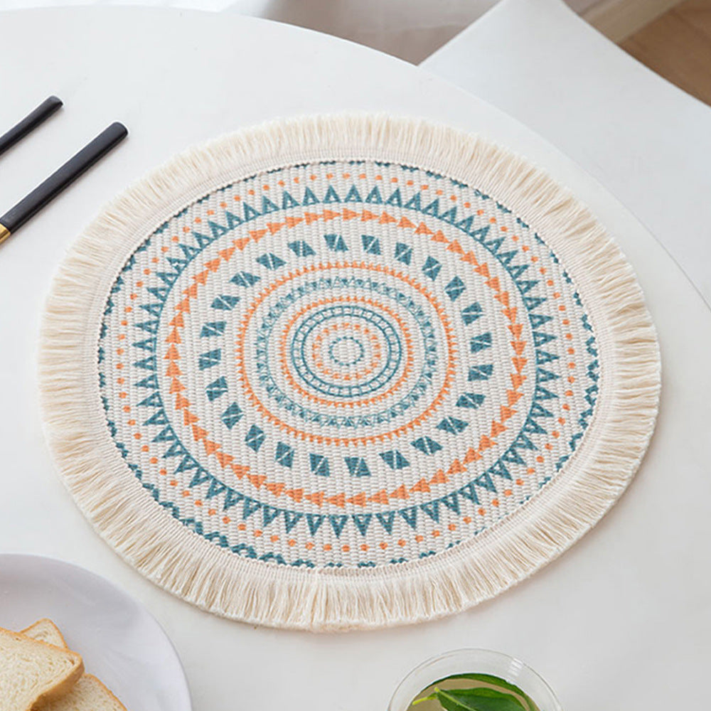 Round woven placemat with fringes and mandala jacquard structure