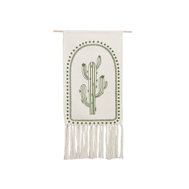 Woven wall hanging with hand-drawn mushroom motif and long cotton fringes