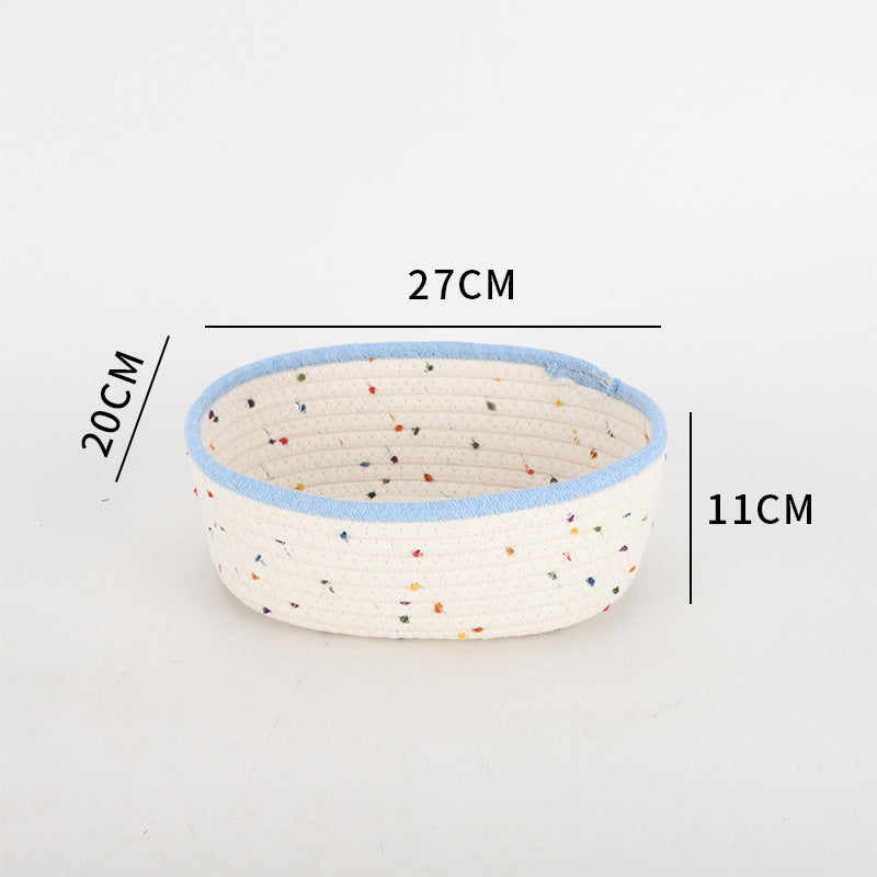 Storage basket made of natural cotton fabric with colorful dots
