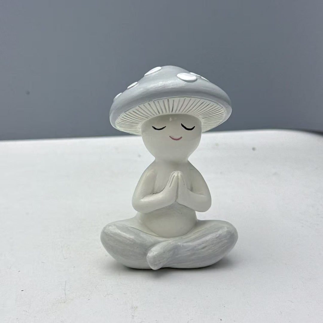 Decorative figure of a meditating mushroom