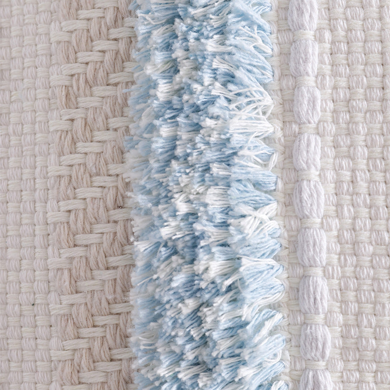 Structured living room carpet with 3D tufting and geometric diamond relief