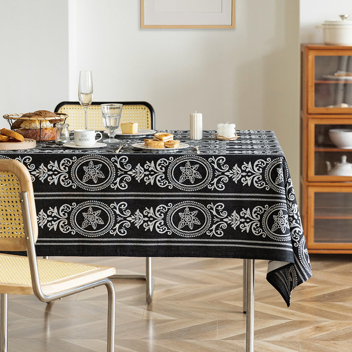 Reversible jacquard tablecloth with floral medallion reliefs