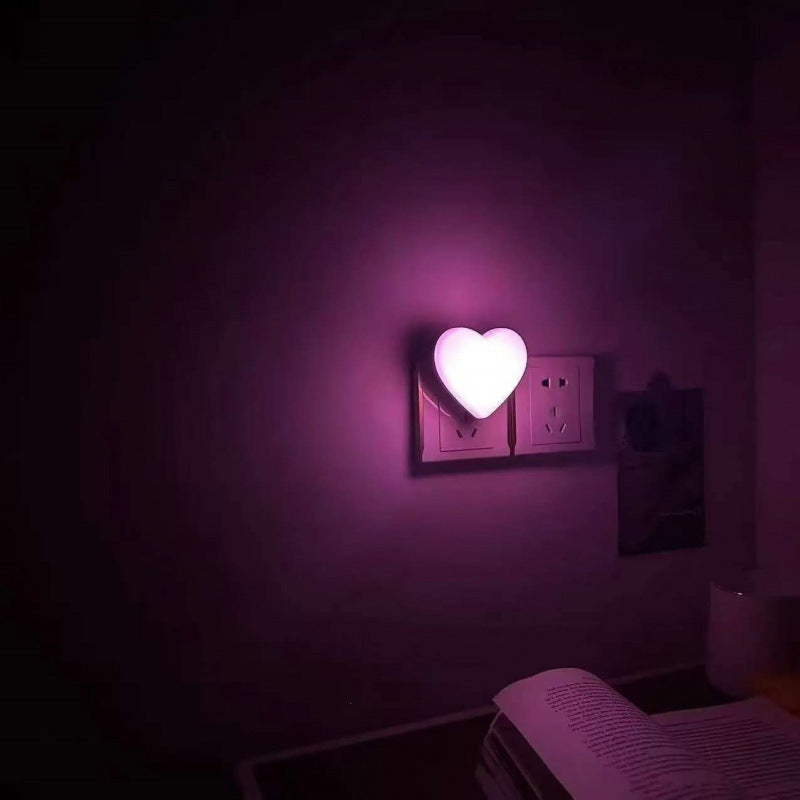 Heart-shaped plug-in ambient night light with soft LED lighting