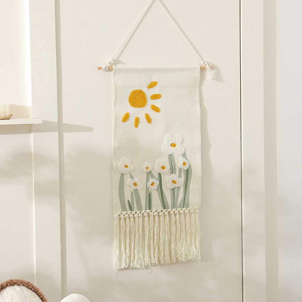 Woven cotton wall hanging with punch needle flower relief and fringes