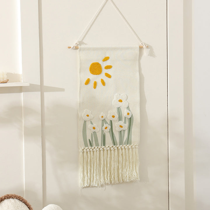 Woven cotton wall hanging with punch needle flower relief and fringes
