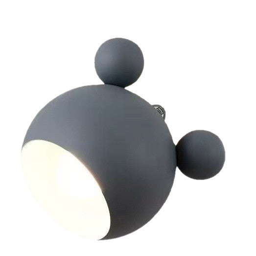 Children's decorative wall lamp with wooden background and bear ears