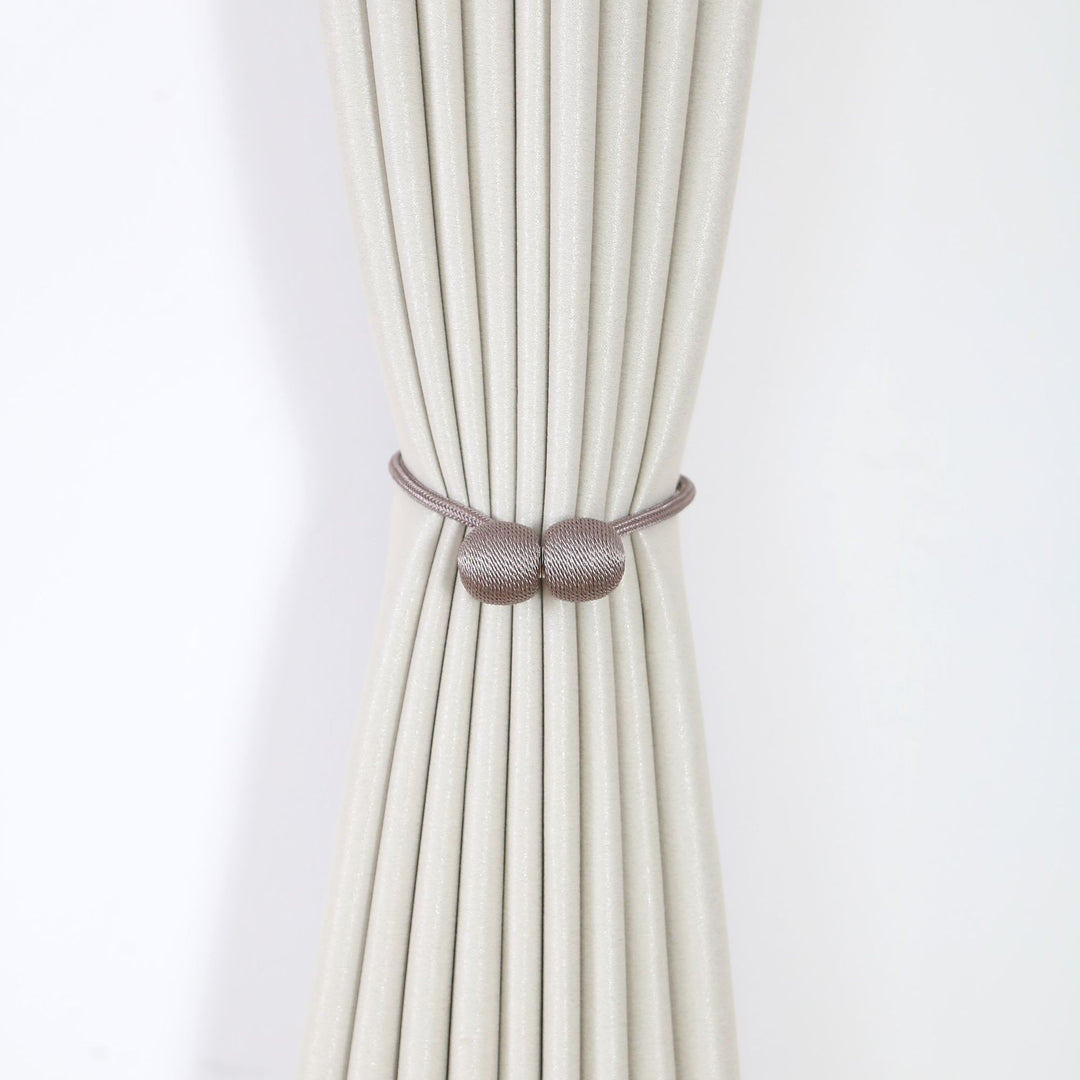 Decorative curtain tieback