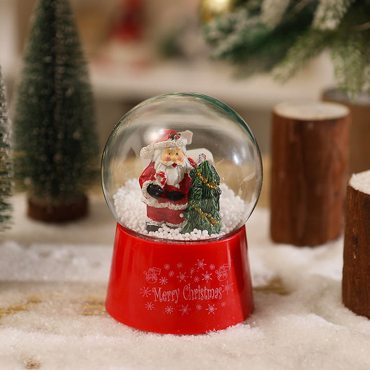 Snow globe with Santa Claus and Christmas tree