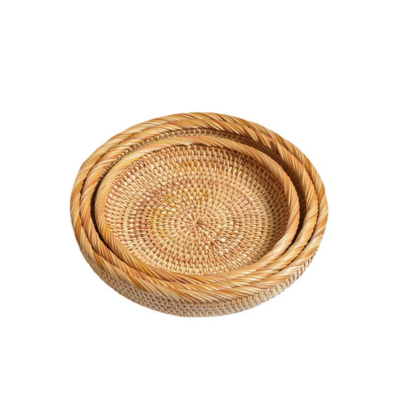 Round serving platter made of braided rattan