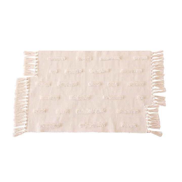 Woven rug in Boho-minimalist style with contrasted tufting and cotton fringes