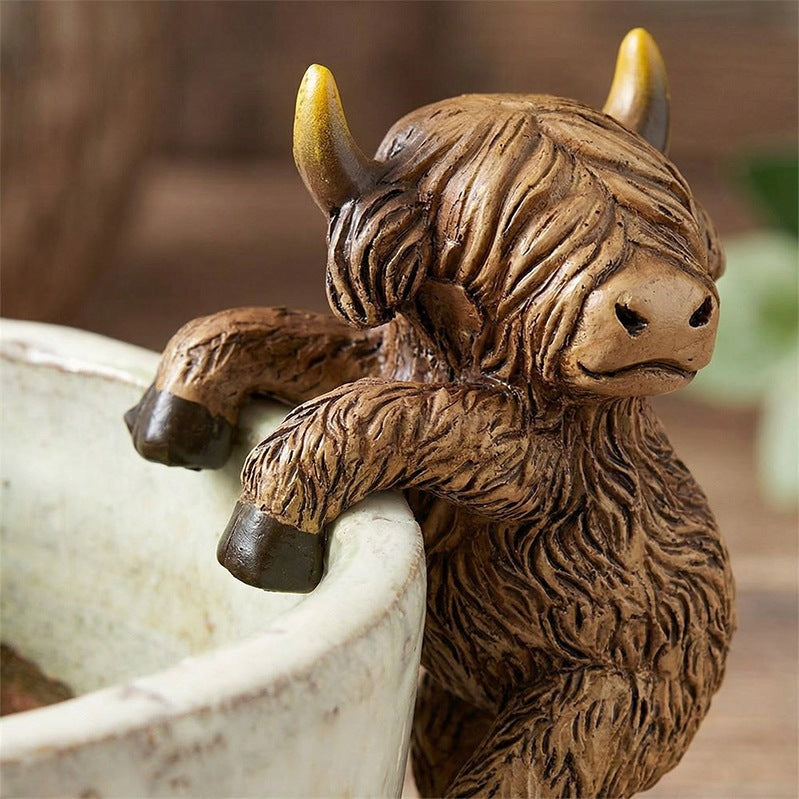 Playful Highland Cow Figurine