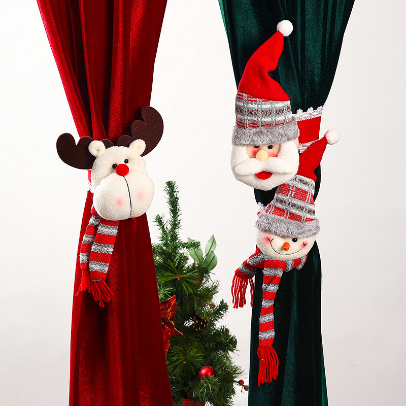 Decorative curtain holder with Christmas moose motif