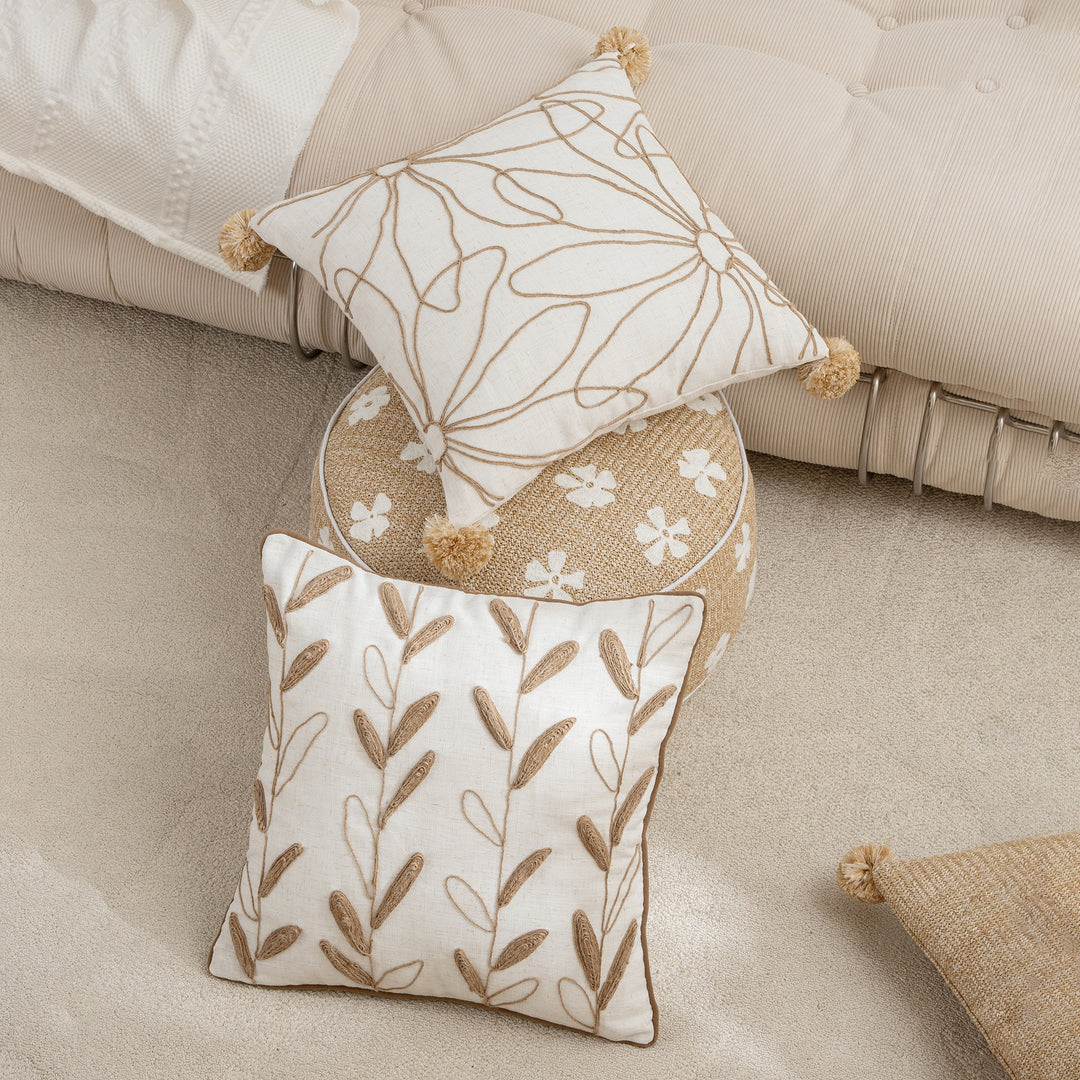 Decorative linen cushion with hand-stitched jute application