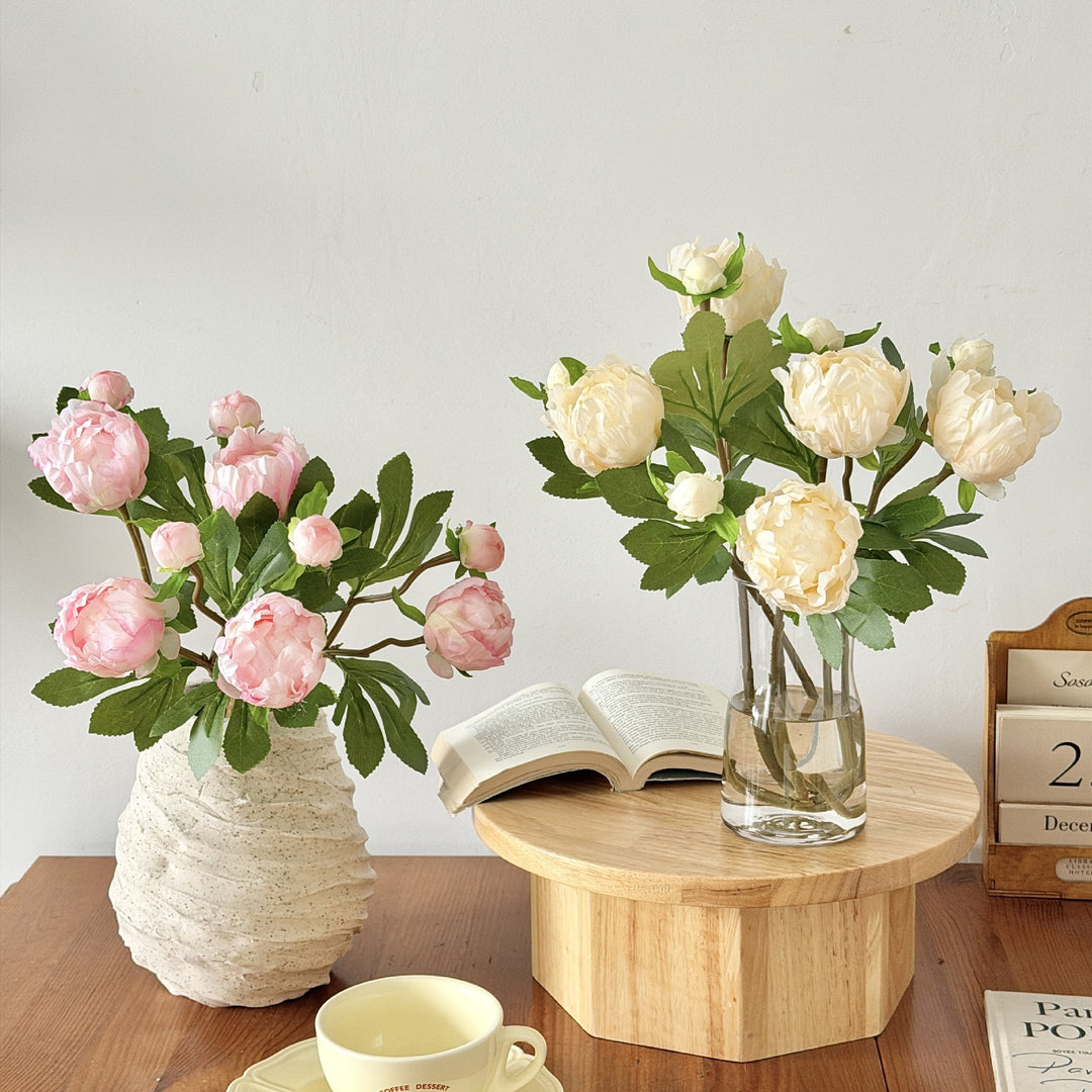 Artificial peony bouquet with delicate flowers and leaves