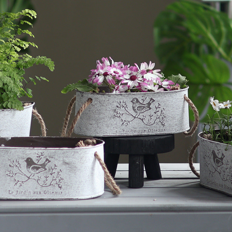 Decorative storage basket made of metal with natural design