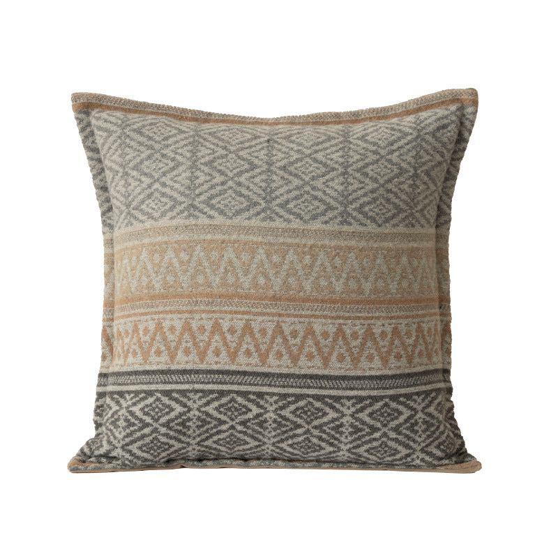 Woven decorative cushion cover in ethnic jacquard style with textured cotton blend